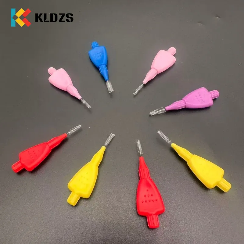 Sikat Interdental berbentuk pesawat